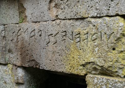 Etruscan writing on Orvieto tomb lintel.