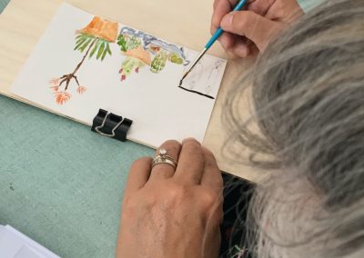 Painting plant illustrations during an Orvieto art tour.