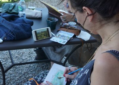 Painting in a watercolor journal on an Orvieto art tour.