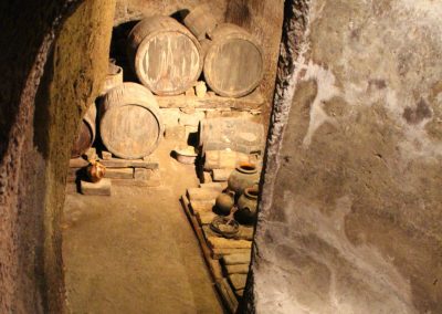 Ancient wine barrels inside Pozzo della Cava in Orvieto.